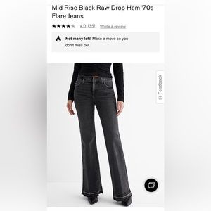 MID RISE BLACK RAW DROP HEM '70S FLARE JEANS